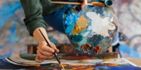 top-view-attractive-woman-hands-drawing-amazing-picture-canvas-modern-cozy-art-workshop.jpg - Центр Мой бизнес