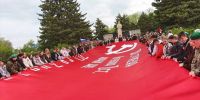 Развернуто «Знамя Победы» под девизом «Народ и армия едины - Мы непобедимы!» - Туркменский район