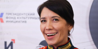 Первая женщина, ставшая Героем России на СВО, смотрела парад рядом с Путиным - M24.Ru