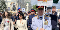 Офицеры следственного управления СК России по Омской области прошли в марше «Бессмертного полка» - Следственный комитет