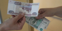 Деньги в руках Долгополова О. А., ИА UssurMedia.ru - ChitaMedia