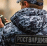 сотрудник Росгвардии говорит по рации - ИА Nord-News.Ru