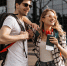 travelers-with-backpacks-poses-near-modern-airport_1.jpg - GorodnaBire.Ru