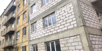 В Мариуполе подмосковные специалисты помогли восстановить конструктив многоэтажного дома и заменить инженерные системы - MosRegToday.Ru