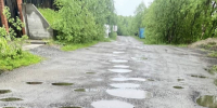 Жители Колы просят убрать «лунные кратеры» с одной из улиц - SeverPost.ru