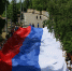В Саратове ко Дню России развернули 100-метровый флаг России - Единая Россия