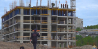 На стройке домов в Мурманске выявили 12 миграционных нарушений [видео] - SeverPost.ru