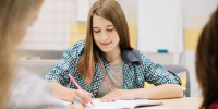 concentrated-schoolgirl-studying - ТРК Щелково