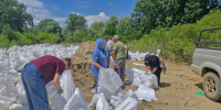 В Крымском районе начали строить временную заградительную дамбу для спасения населенных пунктов и сельхозугодий - Югополис