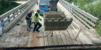На дороге Таксимо - Бодайбо восстановили движение по мосту через реку Бисяга - Baikal24.Ru
