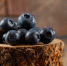 yummy-blueberries-wooden-piece-wooden-stone-tile-background-side-view-2.jpg - Gorod3466.Ru