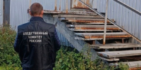 следователь стоит около лестницы - ИА Nord-News.Ru