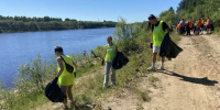 "Речная лента": работники Сыктывкарского водоканала совместно с представителями Сбербанка и "Комитеплоэнерго" очистили часть берега Сысолы от мусора - ИА Комиинформ