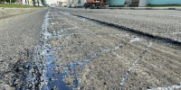 Ремонт автодороги по улице Вокзальная - Междуреченский городской округ