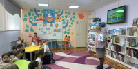 Познавательный час "Правила дорожные знать каждому положено!» - Магаданская ЦБС