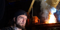 Байкер "Хирург" (Александр Залдастанов) на фоне реактора (кадр из фильма). - Администрация г. Вологда