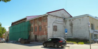 Кирпичи вместо сайдинга: как в центре Барнаула спасают фасады старинного здания. Фото - Сетевое издание Толк