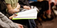 selective-focus-shot-person-holding-book - ТРК Щелково