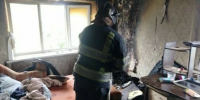 Комната после пожара в пятиэтажке Барнаула / Фото: МЧС по Алтайскому краю - ИА Амител