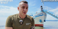 Пловец. Скриншот видео пресс-службы регионального отделения НФ - Irk.Ru