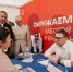 На фото Алексей Текслер ведет прием в общественной приемной на фестивале.Автор фото - Вадим Орлов, администрация Коркинского муниципального округа., Изображение. - Правительство Челябинской области