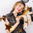 Crazy party time of beautiful women in elegant black dress with gift box celebrating birthday,sparkling gold confetti, having fun, dancing. Emotion face,red lips, eyes closed. - Iskitim-Gazeta.Ru