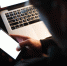 concentrated-man-using-laptop-computer-phone_1.jpg - GorodnaBire.Ru