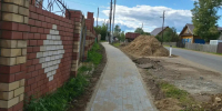 В Афанасьево благоустраивают тротуары на улице Красных Партизан - Министерство строительства