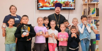 Встреча священника с детьми в районной библиотеке поселка Излучинск - Ханты-Мансийская Митрополия