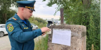 Через подтопленный участок переправили трёх жителей п. Приамурский спасатели ЕАО - РИА Биробиджан