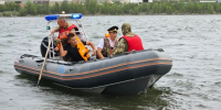 В Тувы росгвардейцы на катерах оказали помощь группе сапбордистов, оказавшихся в непогоду на Енисее - Росгвардия