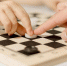 close-up-kid-playing-chess - ТРК Щелково