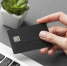 high-view-laptop-and-black-shopping-card - РИА 7 Новостей