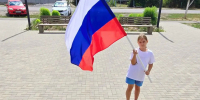 В хуторе Северный Целинского района прошла акция «Триколор» в канун Дня флага России - DeltaCelina.Ru