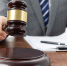 closeup-shot-person-with-gavel-hand-papers-table_1.jpg - GorodnaBire.Ru