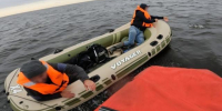 Лодку северодвинцев уносило в море. Их спасли - Tv29.Ru