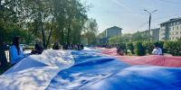 В Шелехове с участием активистов «Единой России» прошла ежегодная патриотическая акция «Флаг России в наших руках» - Единая Россия