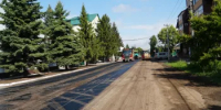 На улице Кирова приступили к укладке выравнивающего слоя асфальта - Администрация города