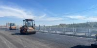 На Сарептском путепроводе началась укладка верхнего слоя нового асфальтобетонного покрытия - Город Волгоград