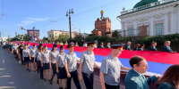 Личный состав УФСИН России по Омской области принял участие в развертывании 55-метрового Государственного флага Российской Федерации - УФСИН России