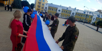ЛДПР провела патриотическую акцию с 50-метровым флагом у Громовой башни в Смоленске - ЛДПР