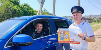В Тахтамукайском районе автоинспекторы и представители цирка напомнили водителям о правилах перевозки детей в салоне автомобиля. - Тахтамукайский район