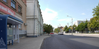 На улице Коммунистической приступили к укладке второго слоя асфальта - Администрация города