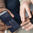 arabic-woman-teaching-senior-man-use-smartwatch-with-smartphone - Новый Компаньон