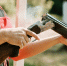 man-opens-shotgun-bolt-after-one-shot-with-smoke.jpg - Gorod3466.Ru