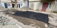 Во дворе дома № 51 по улице Керимова в Махачкале приступили к укладке нового асфальта - Махачкалинские известия