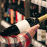 male-customer-holding-bottle-red-wine-close-up.jpg - Gorod3466.Ru