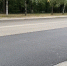 На Курчатова укладывают второй слой асфальта. - NgRegion.Ru