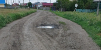 Жители Куломзино предложили отремонтировать дорогу на одной из улиц села. - Оконешниковский район