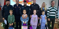 В рамках акции «Собери ребёнка в школу» Главное управление Росгвардии по Московской области вручило школьные рюкзаки детям сотрудников - Росгвардия